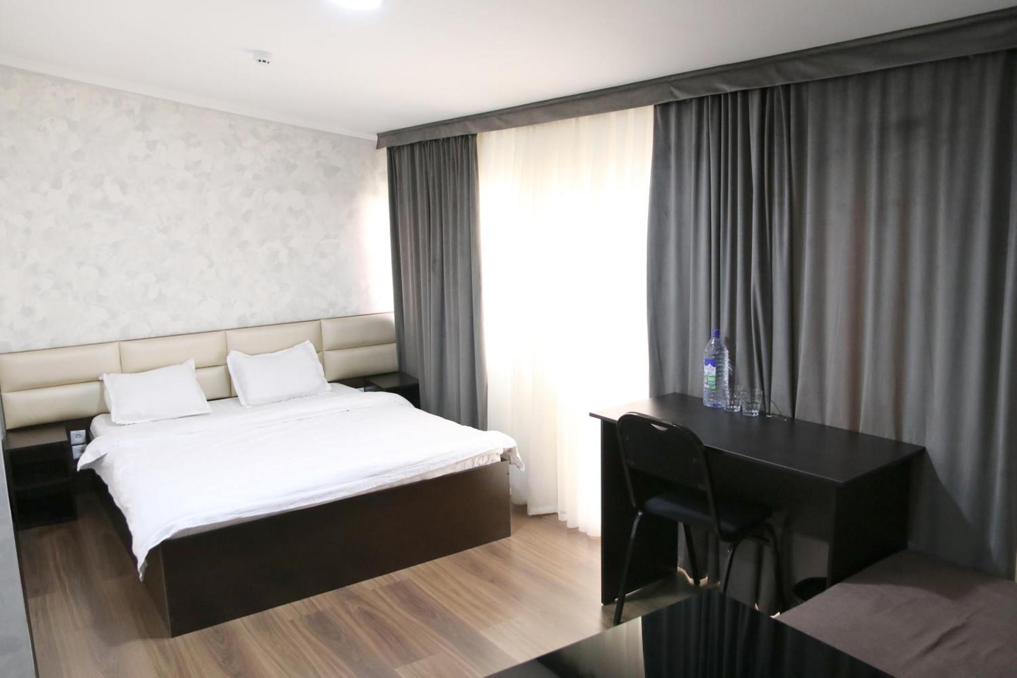 Orion Hotel Ташкент Стая снимка